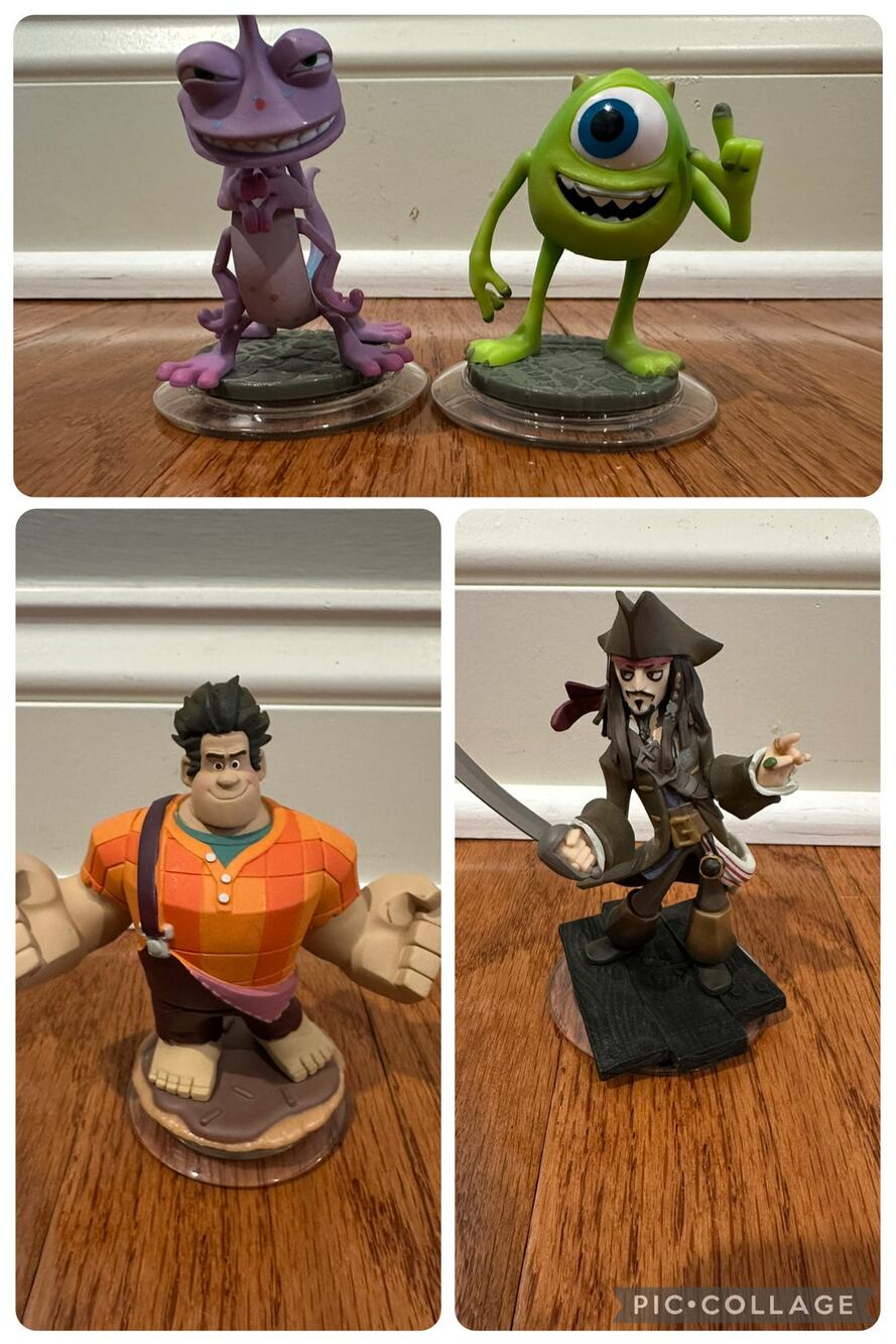 Disney Infinity figures Jack Sparrow, Monsters Inc, and Wreck it Ralph